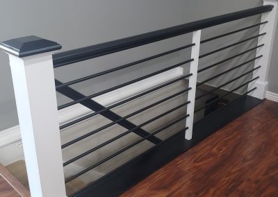 Black and white horizontal stair railing