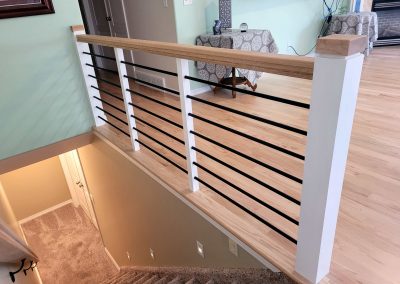 Horizontal wood railing and metal bars