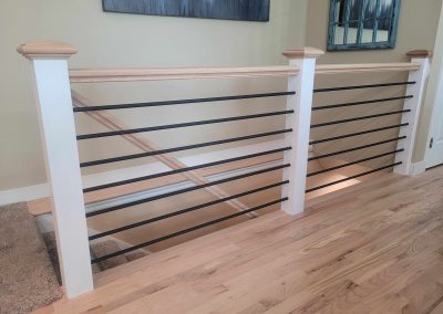 a wooden floor with black horizontal bars